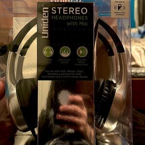 Pair of brand new never opened wired headphones with a mic